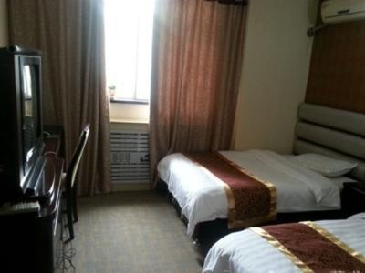 Xinhang Hotel Urumqi Exterior foto